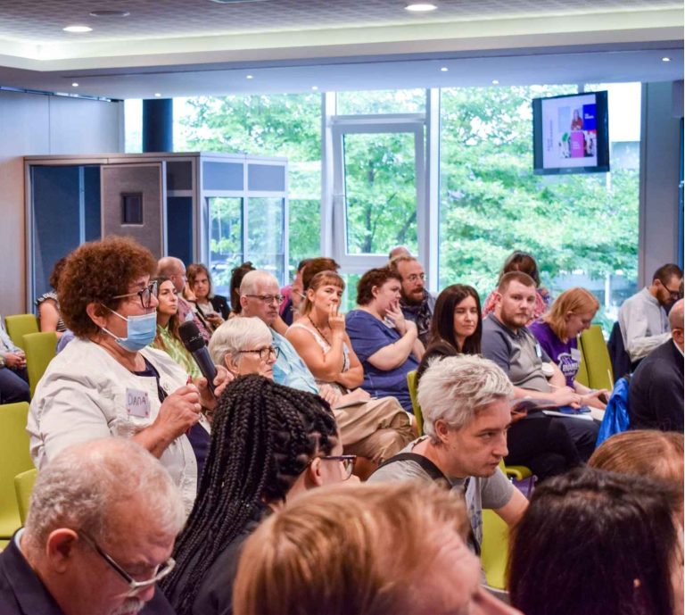 People talking at the conference